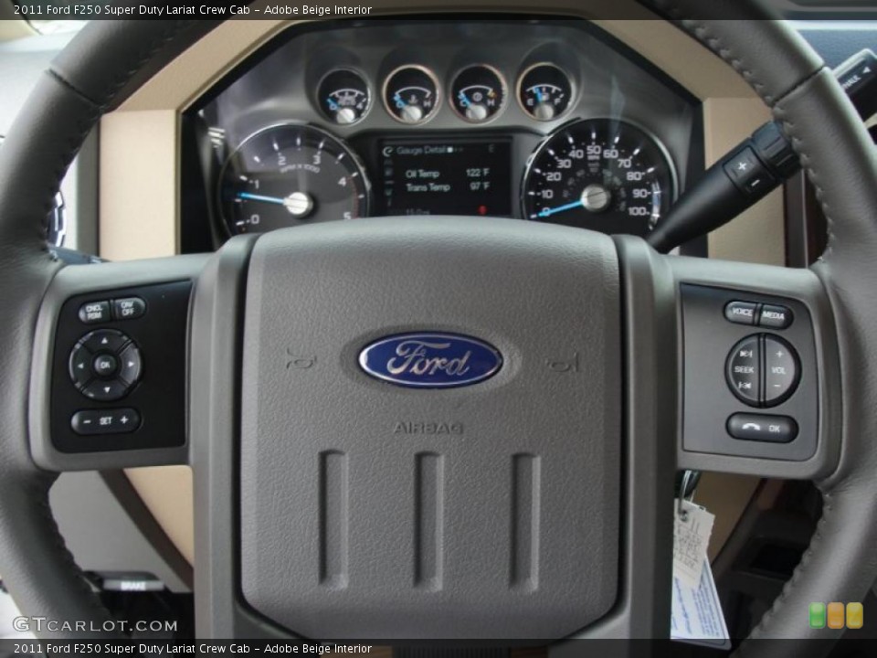 Adobe Beige Interior Controls for the 2011 Ford F250 Super Duty Lariat Crew Cab #47024550