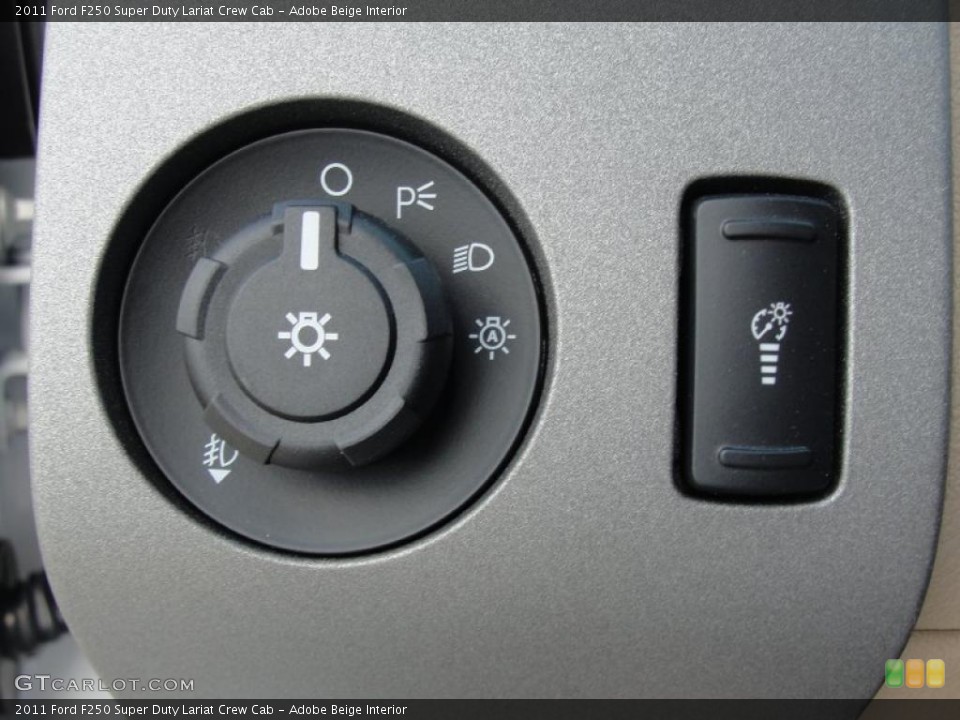 Adobe Beige Interior Controls for the 2011 Ford F250 Super Duty Lariat Crew Cab #47024586