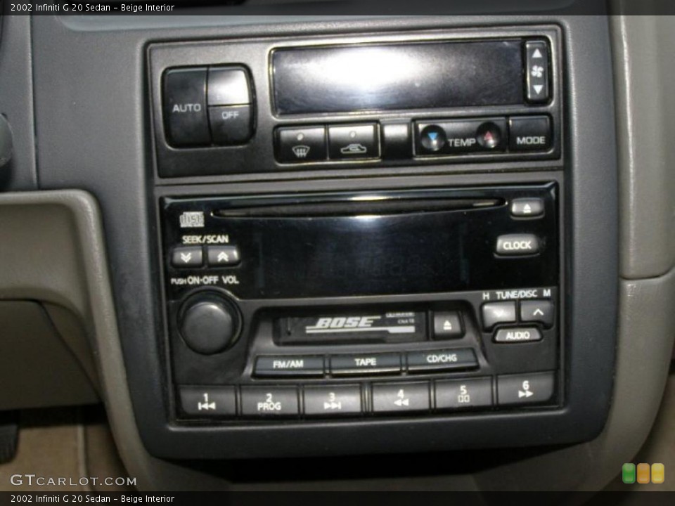 Beige Interior Controls for the 2002 Infiniti G 20 Sedan #47047458