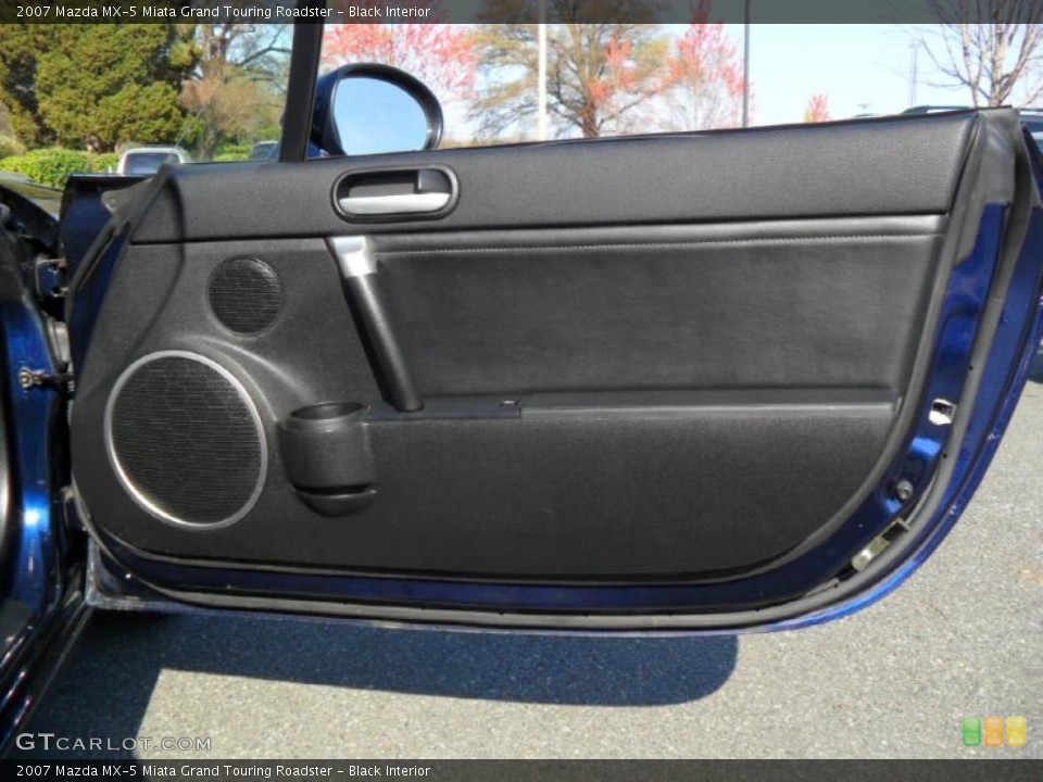 Black Interior Door Panel for the 2007 Mazda MX-5 Miata Grand Touring Roadster #47054665