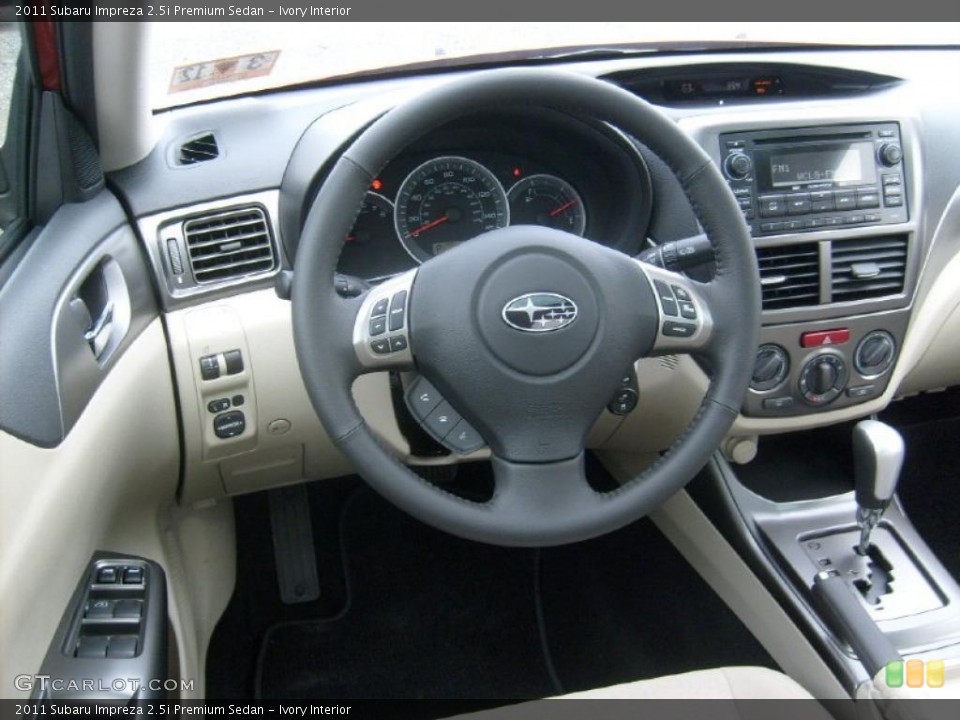 Ivory Interior Steering Wheel for the 2011 Subaru Impreza 2.5i Premium Sedan #47065838