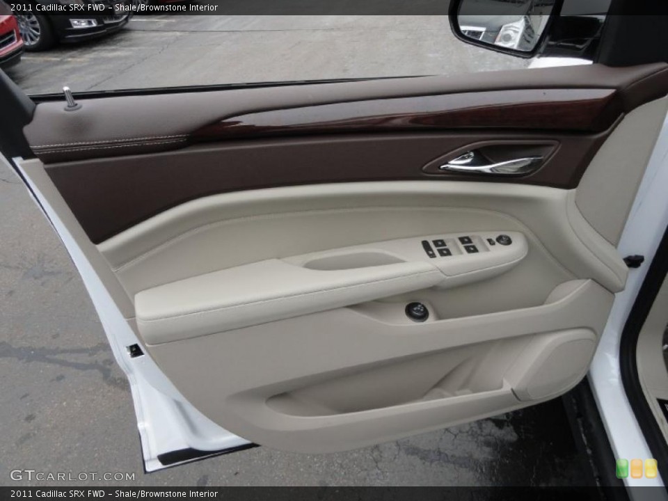 Shale/Brownstone Interior Door Panel for the 2011 Cadillac SRX FWD #47066222