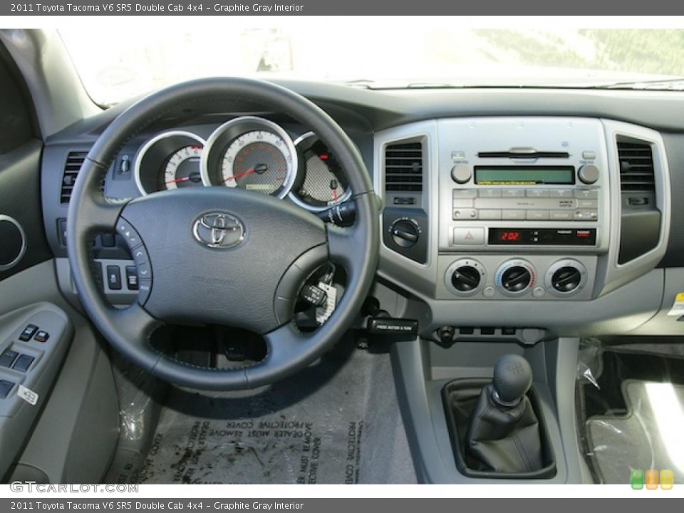 Graphite Gray Interior Dashboard for the 2011 Toyota Tacoma V6 SR5 Double Cab 4x4 #47074988
