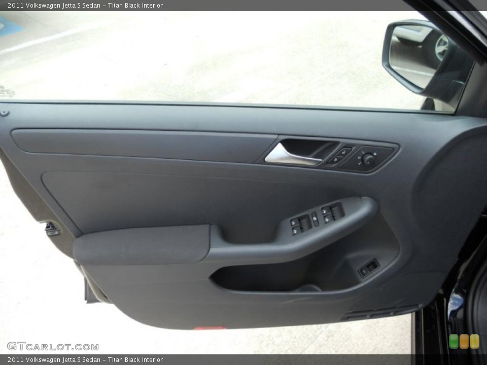 Titan Black Interior Door Panel for the 2011 Volkswagen Jetta S Sedan #47100353