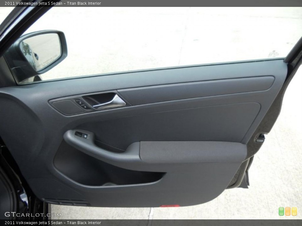 Titan Black Interior Door Panel for the 2011 Volkswagen Jetta S Sedan #47100377