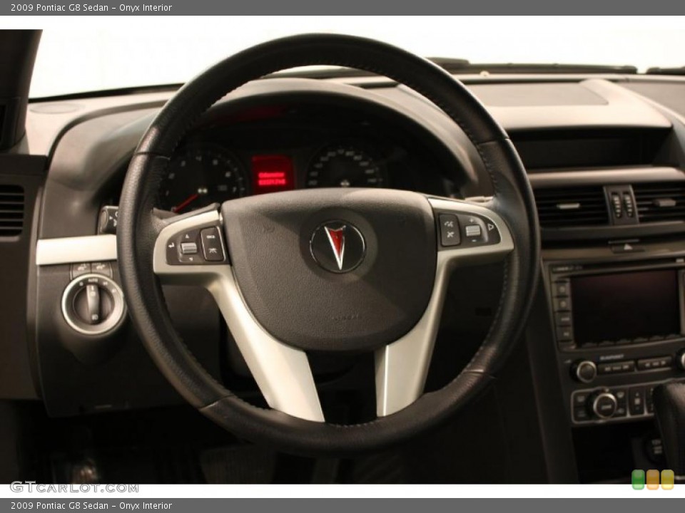 Onyx Interior Steering Wheel for the 2009 Pontiac G8 Sedan #47114438