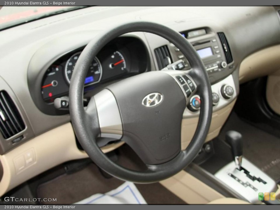 Beige Interior Steering Wheel for the 2010 Hyundai Elantra GLS #47123874