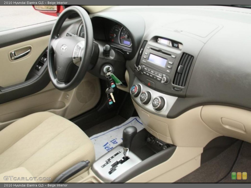 Beige Interior Dashboard for the 2010 Hyundai Elantra GLS #47124024
