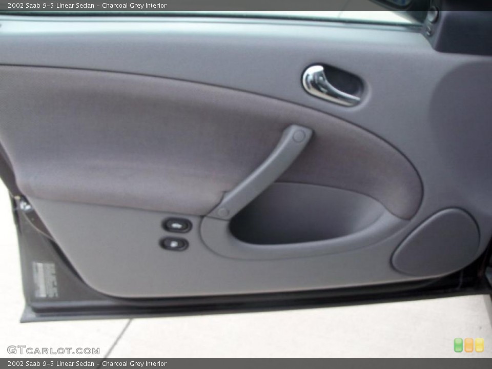 Charcoal Grey Interior Door Panel for the 2002 Saab 9-5 Linear Sedan #47125605