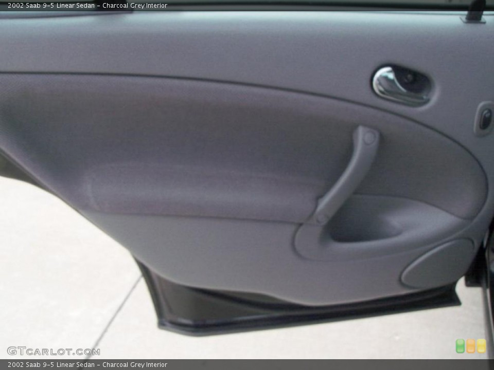 Charcoal Grey Interior Door Panel for the 2002 Saab 9-5 Linear Sedan #47125614