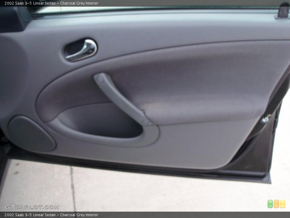 Charcoal Grey Interior Door Panel for the 2002 Saab 9-5 Linear Sedan #47125629