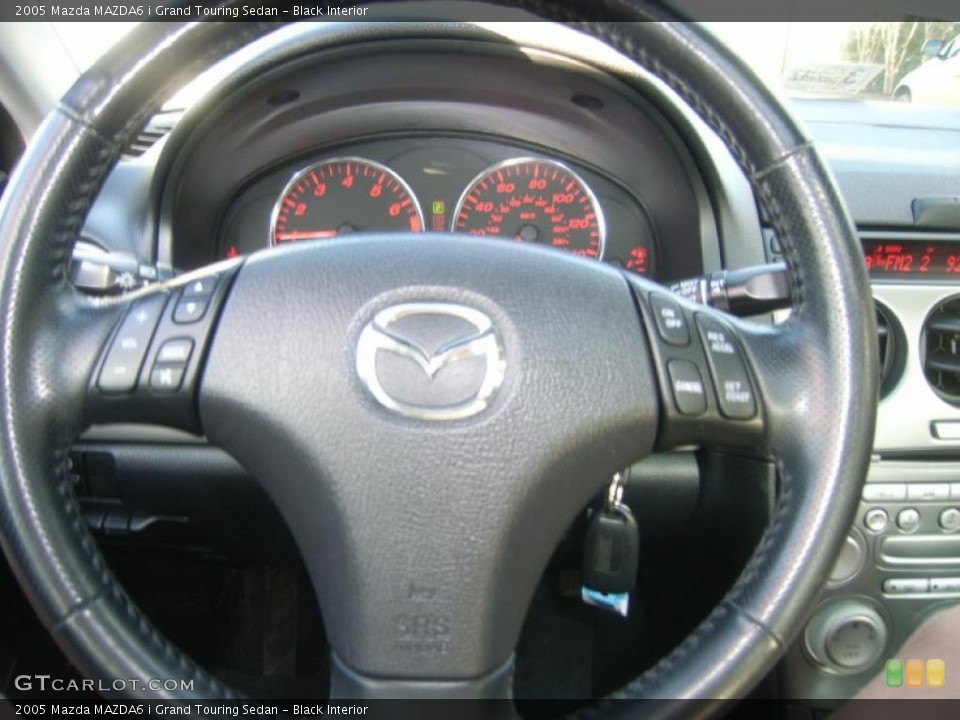 Black Interior Steering Wheel for the 2005 Mazda MAZDA6 i Grand Touring Sedan #47132490