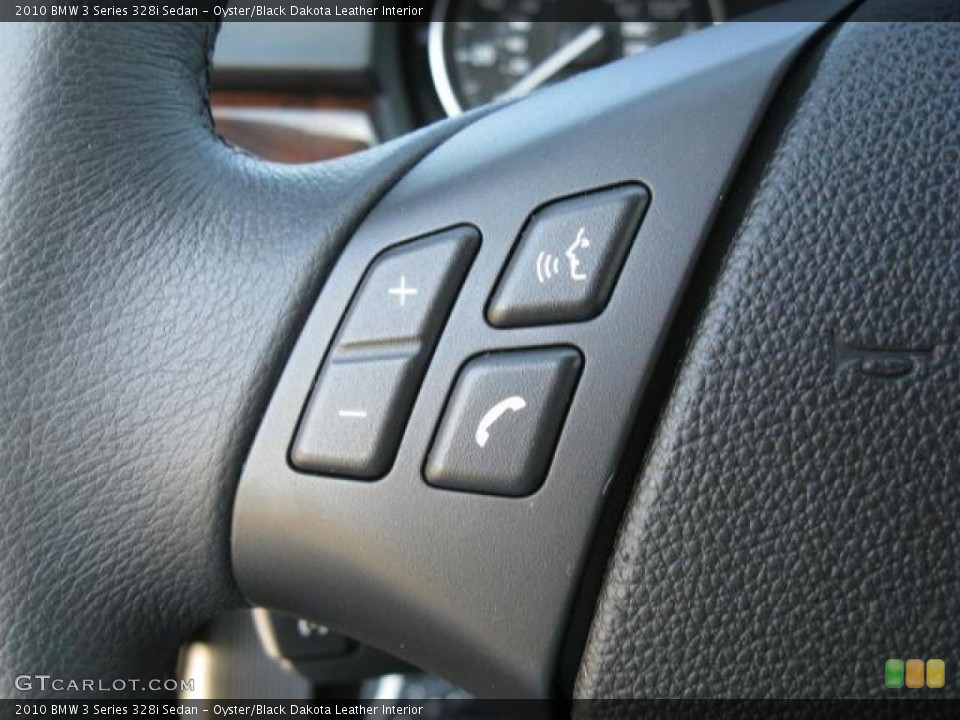 Oyster/Black Dakota Leather Interior Controls for the 2010 BMW 3 Series 328i Sedan #47133690