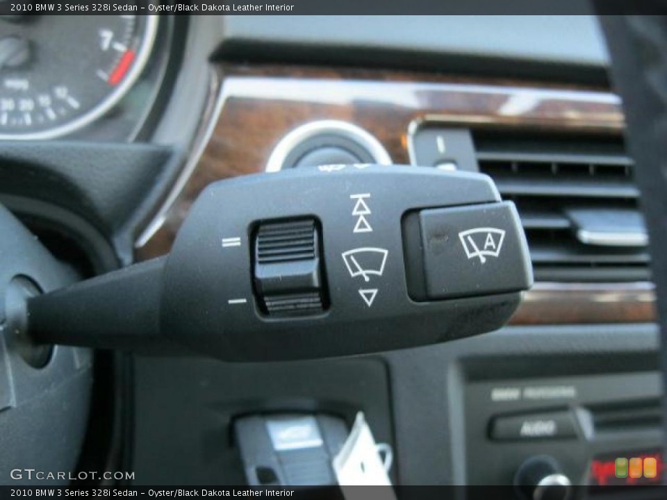 Oyster/Black Dakota Leather Interior Controls for the 2010 BMW 3 Series 328i Sedan #47133705