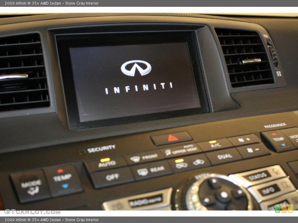 Stone Gray Interior Controls for the 2009 Infiniti M 35x AWD Sedan #47154645