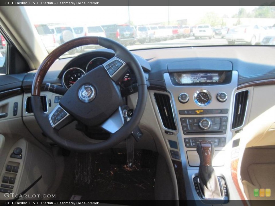 Cashmere/Cocoa Interior Steering Wheel for the 2011 Cadillac CTS 3.0 Sedan #47183997