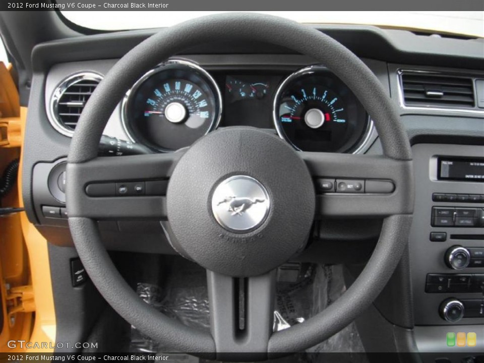 Charcoal Black Interior Steering Wheel for the 2012 Ford Mustang V6 Coupe #47184384