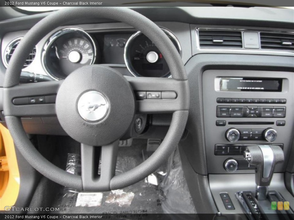 Charcoal Black Interior Dashboard for the 2012 Ford Mustang V6 Coupe #47184414