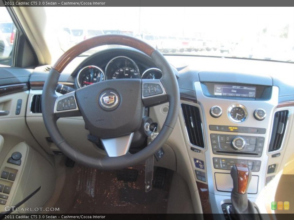 Cashmere/Cocoa Interior Steering Wheel for the 2011 Cadillac CTS 3.0 Sedan #47184810
