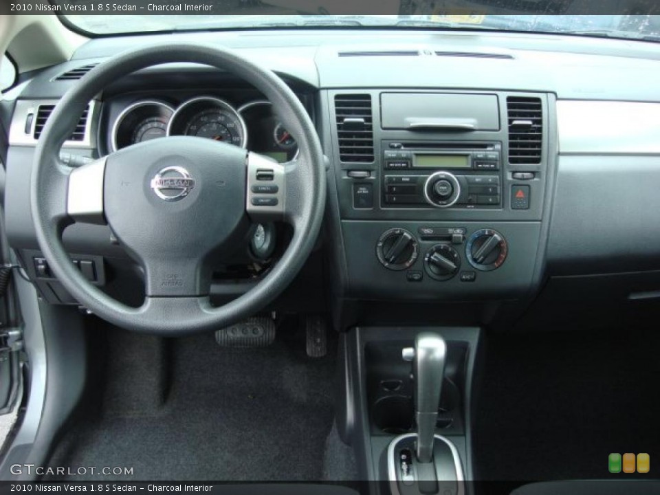Charcoal Interior Dashboard for the 2010 Nissan Versa 1.8 S Sedan #47188230