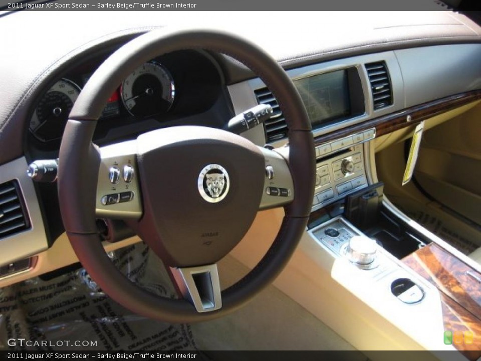 Barley Beige/Truffle Brown Interior Steering Wheel for the 2011 Jaguar XF Sport Sedan #47195510