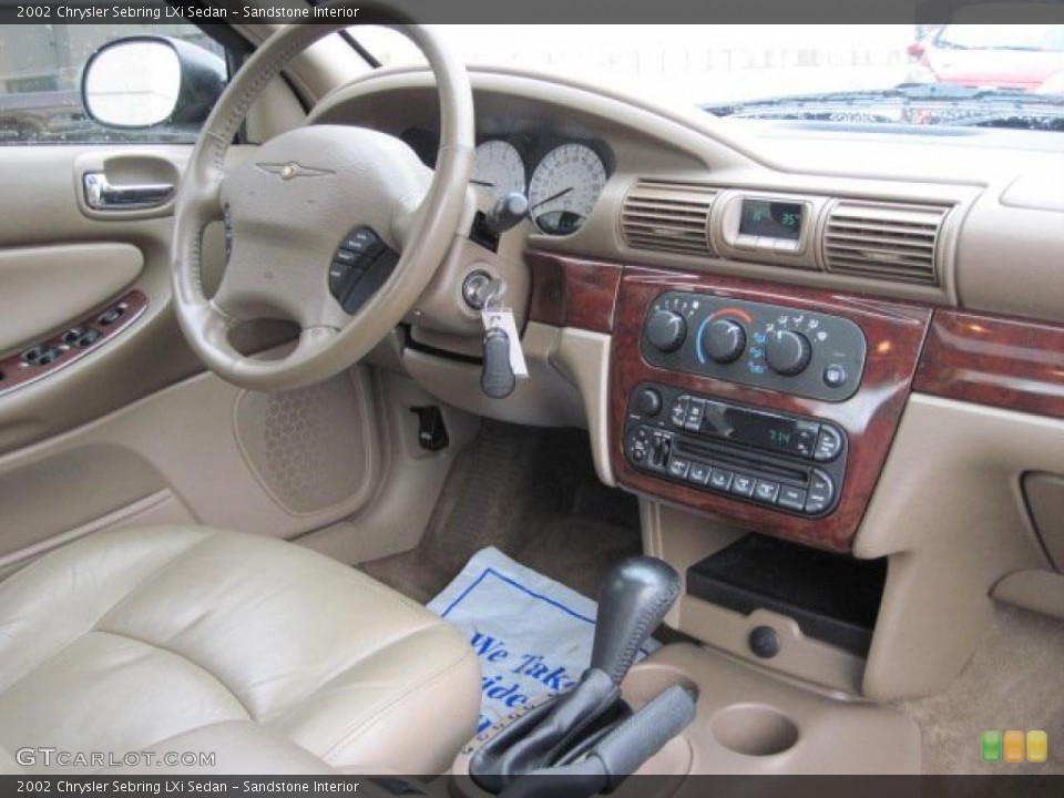 Sandstone Interior Dashboard for the 2002 Chrysler Sebring LXi Sedan #47201069