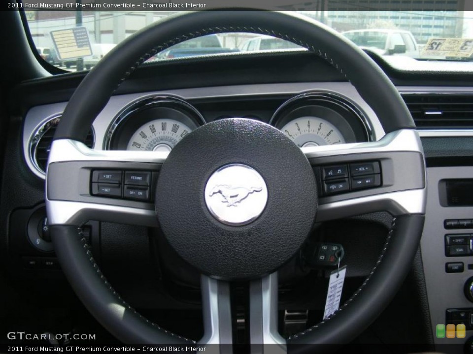 Charcoal Black Interior Steering Wheel for the 2011 Ford Mustang GT Premium Convertible #47203253