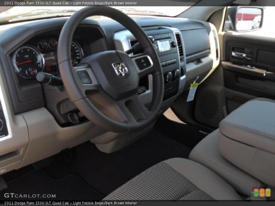 Light Pebble Beige/Bark Brown Interior Prime Interior for the 2011 Dodge Ram 1500 SLT Quad Cab #47219579