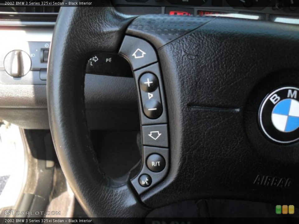 Black Interior Controls for the 2002 BMW 3 Series 325xi Sedan #47220578