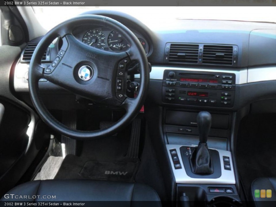 Black Interior Dashboard for the 2002 BMW 3 Series 325xi Sedan #47220608