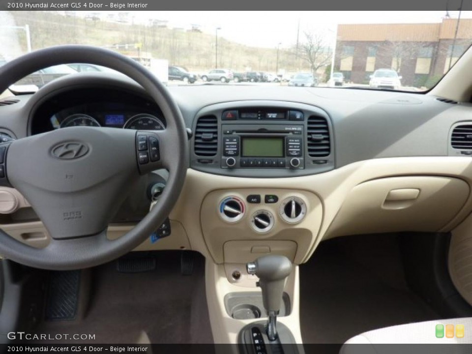 Beige Interior Dashboard for the 2010 Hyundai Accent GLS 4 Door #47224709
