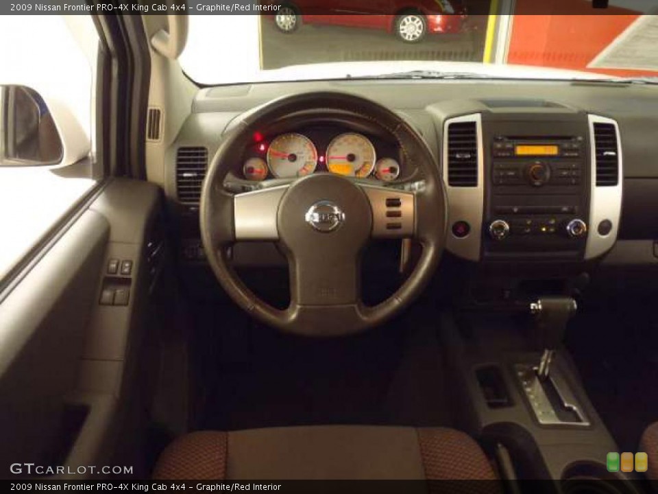 Graphite/Red Interior Dashboard for the 2009 Nissan Frontier PRO-4X King Cab 4x4 #47225108
