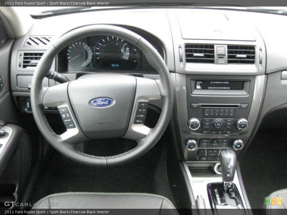 Sport Black/Charcoal Black Interior Dashboard for the 2011 Ford Fusion Sport #47241089