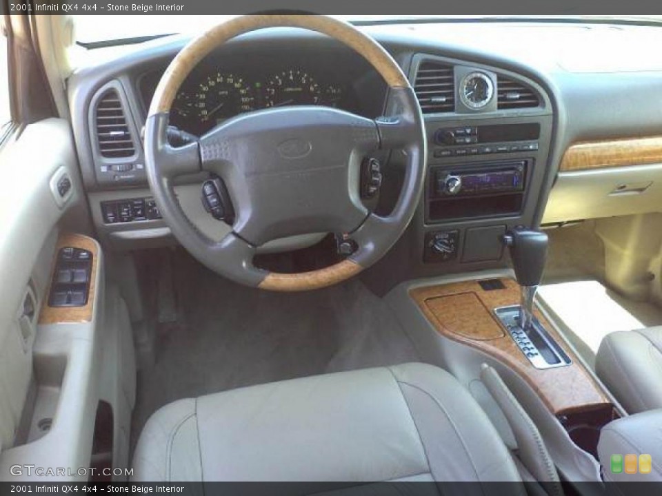 Stone Beige Interior Dashboard for the 2001 Infiniti QX4 4x4 #47242259