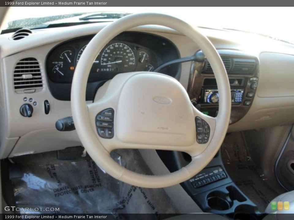 Medium Prairie Tan Interior Steering Wheel for the 1999 Ford Explorer Limited #47248379