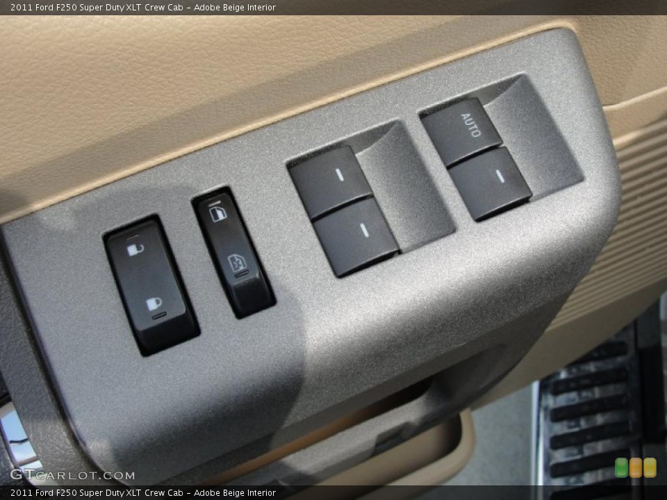 Adobe Beige Interior Controls for the 2011 Ford F250 Super Duty XLT Crew Cab #47253416
