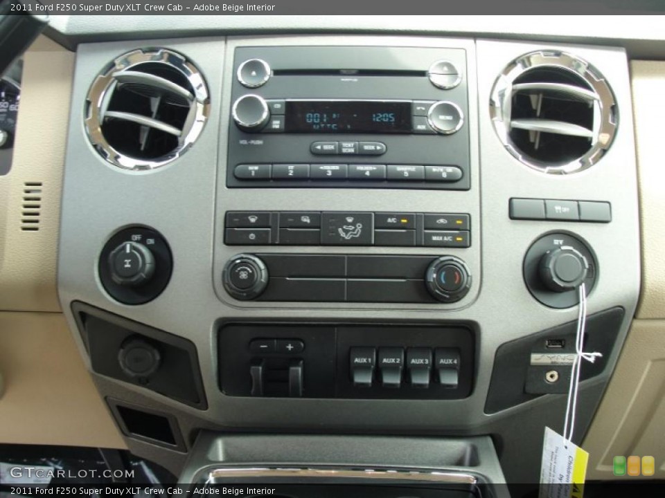 Adobe Beige Interior Controls for the 2011 Ford F250 Super Duty XLT Crew Cab #47253467