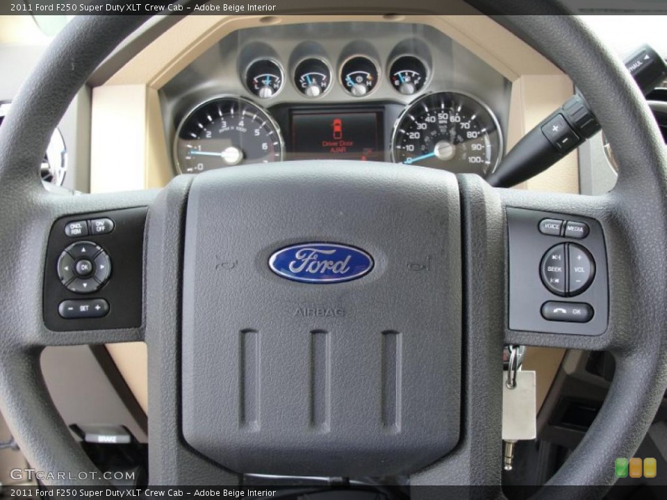 Adobe Beige Interior Controls for the 2011 Ford F250 Super Duty XLT Crew Cab #47253548