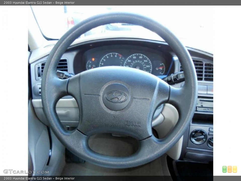 Beige Interior Steering Wheel for the 2003 Hyundai Elantra GLS Sedan #47255018