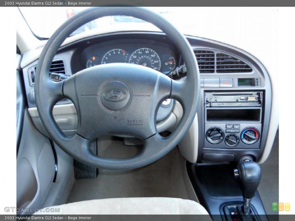 Beige Interior Dashboard for the 2003 Hyundai Elantra GLS Sedan #47255036