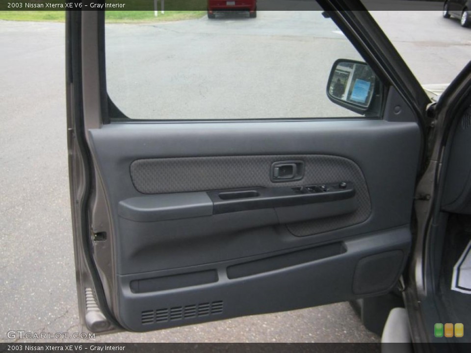 Gray Interior Door Panel for the 2003 Nissan Xterra XE V6 #47255381
