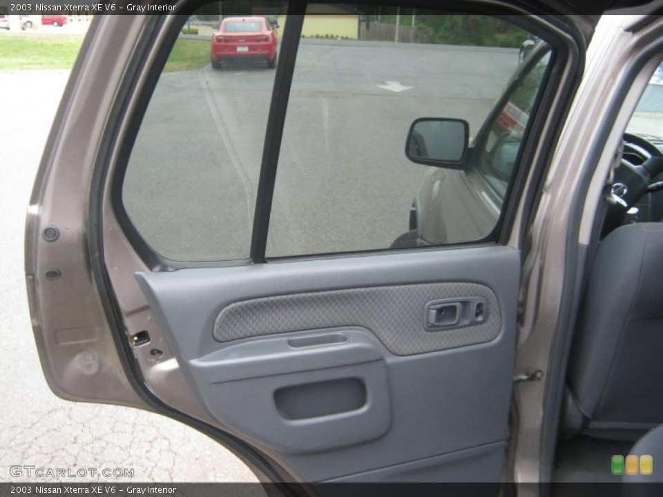 Gray Interior Door Panel for the 2003 Nissan Xterra XE V6 #47255411