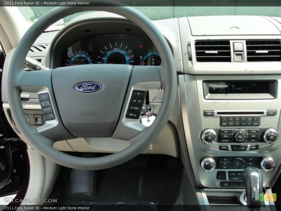 Medium Light Stone Interior Steering Wheel for the 2011 Ford Fusion SE #47261204