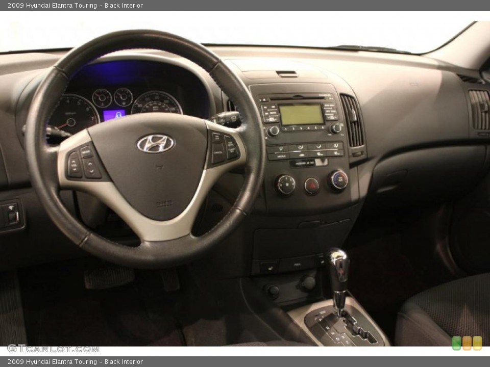 Black Interior Dashboard for the 2009 Hyundai Elantra Touring #47270480