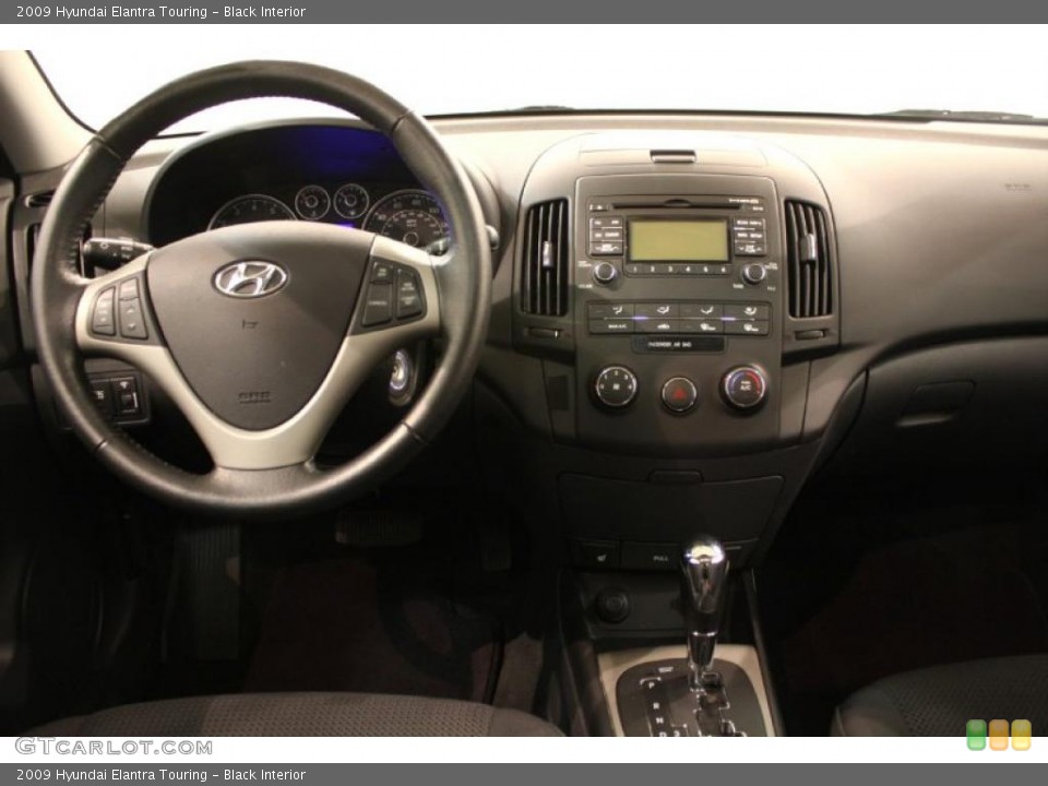 Black Interior Dashboard for the 2009 Hyundai Elantra Touring #47270588