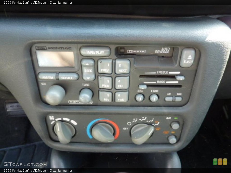 Graphite Interior Controls for the 1999 Pontiac Sunfire SE Sedan #47296172