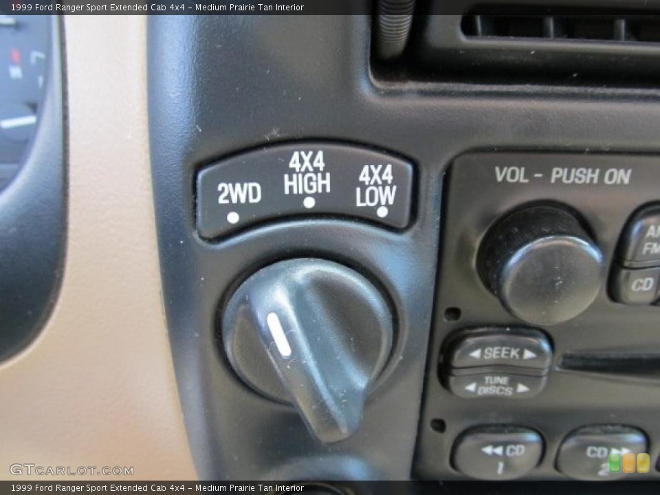 Medium Prairie Tan Interior Controls for the 1999 Ford Ranger Sport Extended Cab 4x4 #47305280