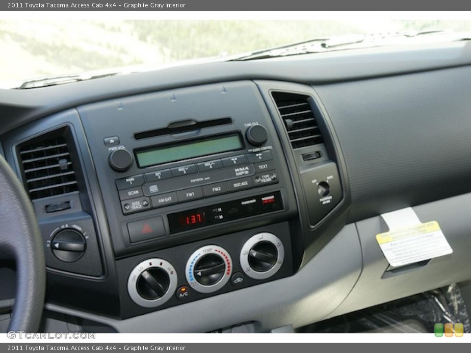 Graphite Gray Interior Controls for the 2011 Toyota Tacoma Access Cab 4x4 #47306174