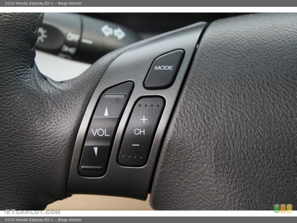Beige Interior Controls for the 2010 Honda Odyssey EX-L #47307923