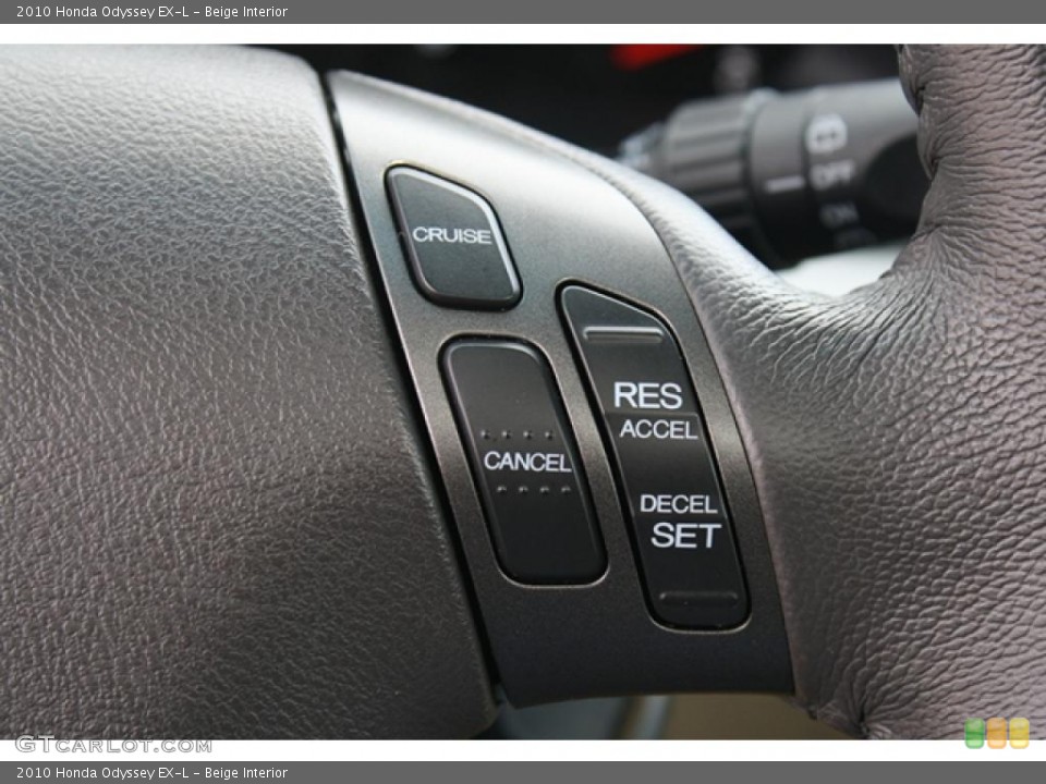 Beige Interior Controls for the 2010 Honda Odyssey EX-L #47307938